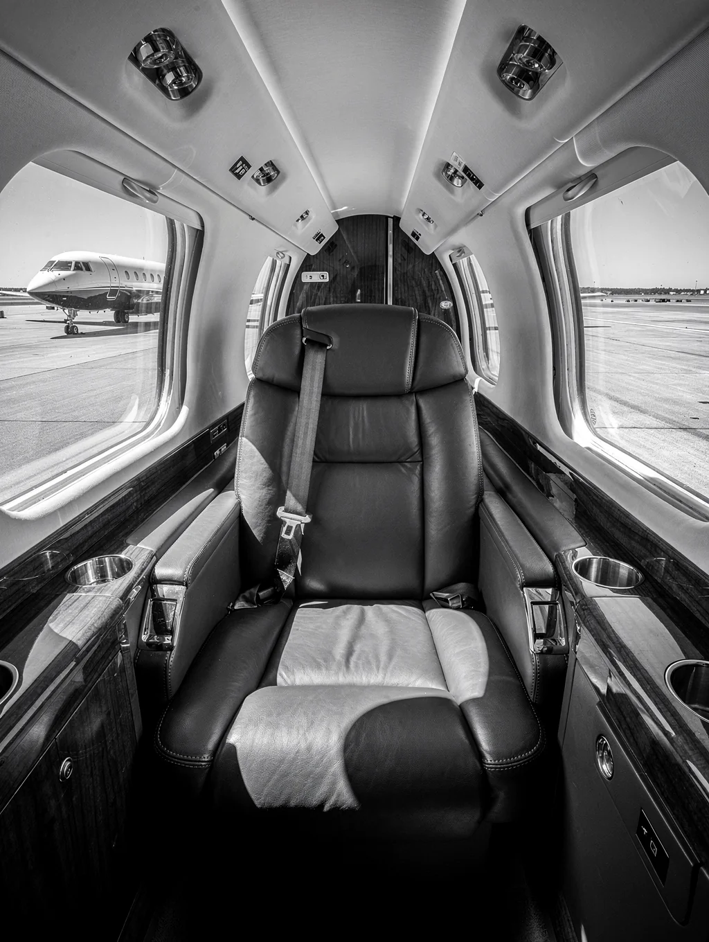Private jet interior overlooking a mountain range